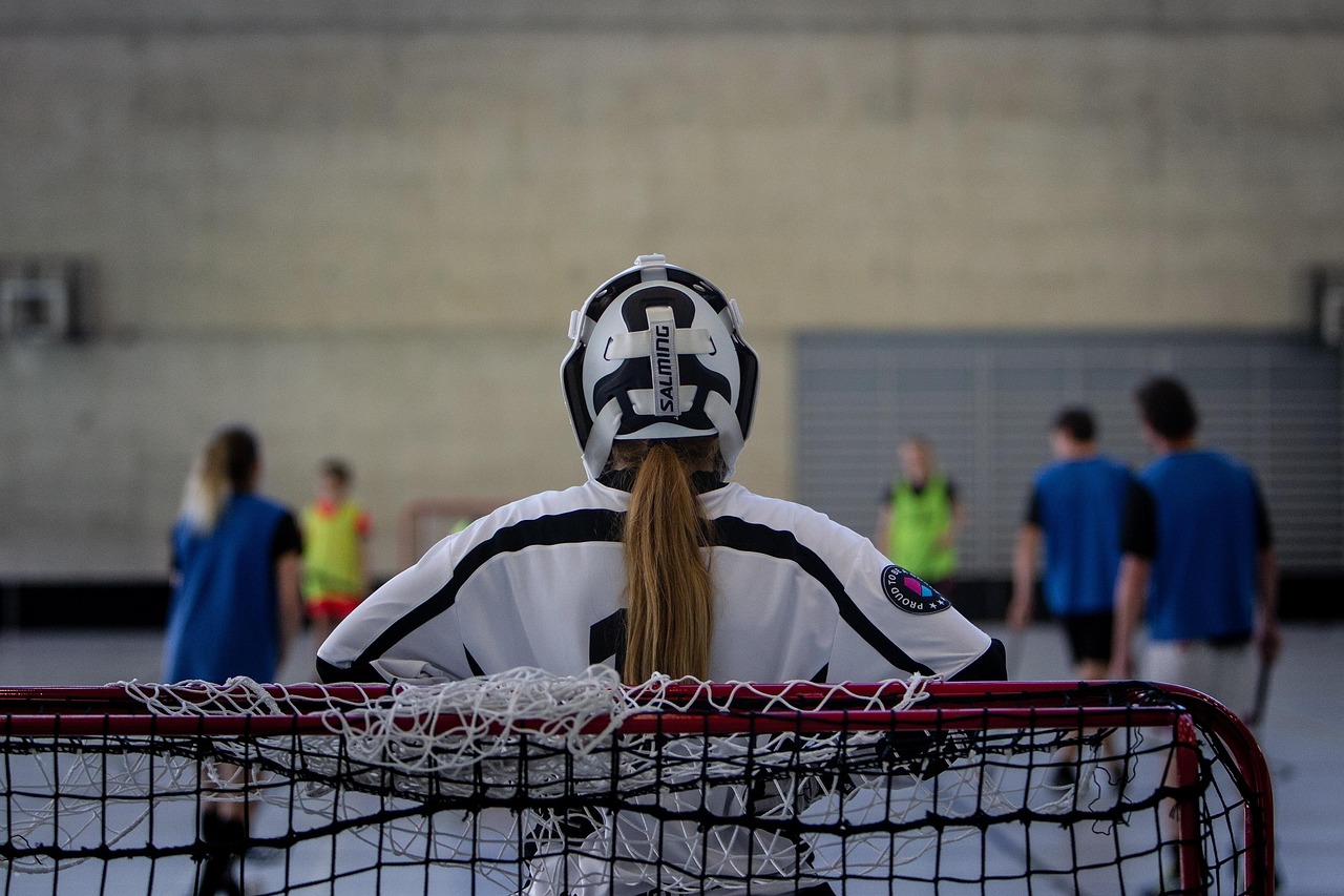 Players listening during a team activity at the club